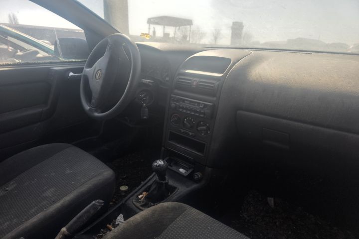 Far stanga Opel Astra 2003 1.4 MT (90 hp)