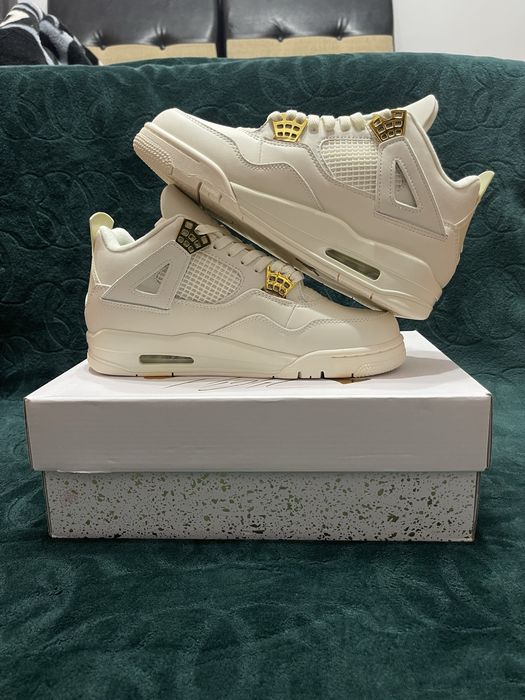 Jordan 4 metalic gold