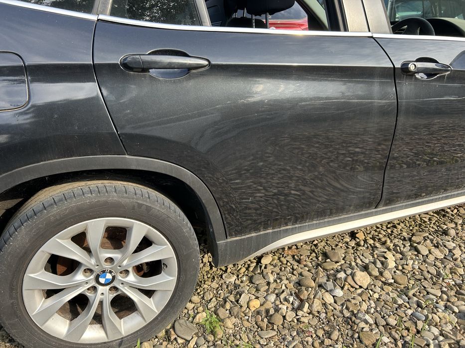 Aripă dreapta spate BMW X1 E84