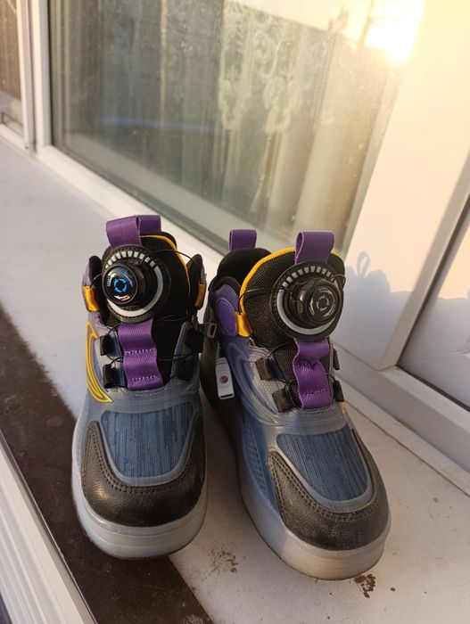 Продам новые кроссовки ролики