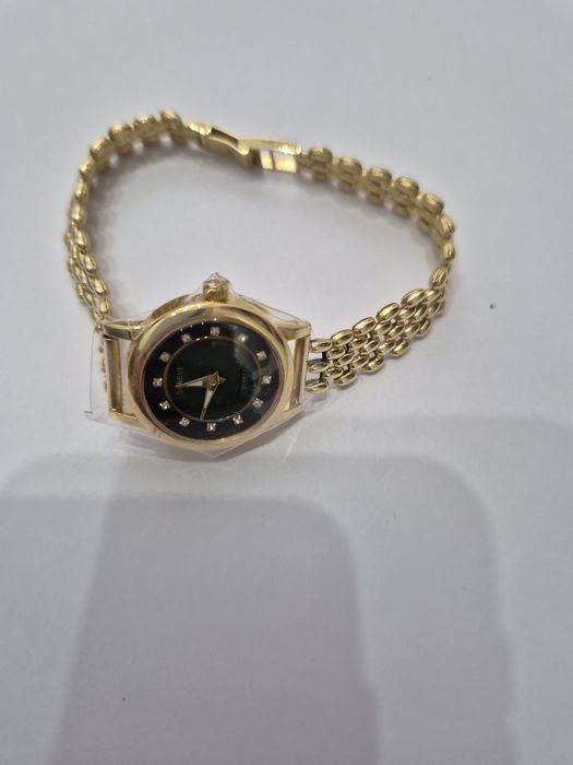 Продам золотой часы 750 пробы