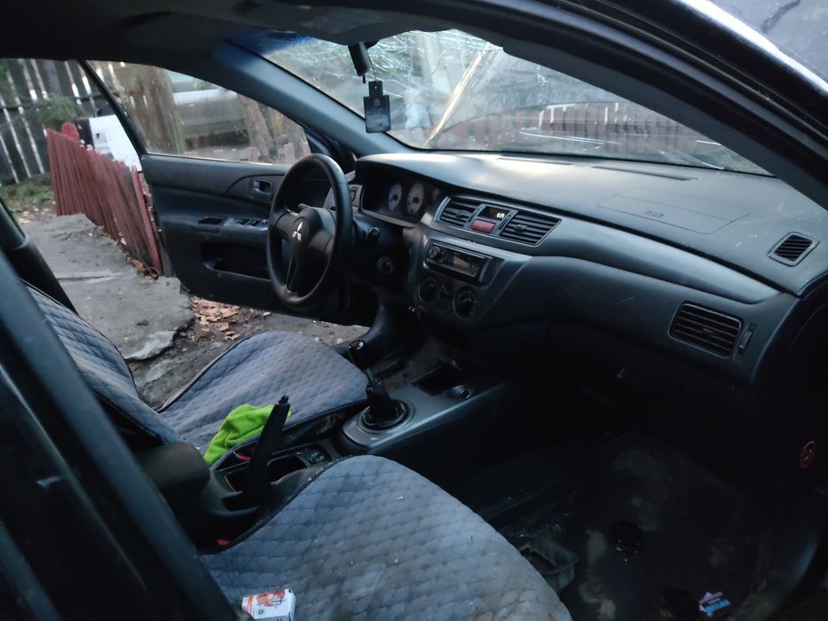 По запчастям Лансер