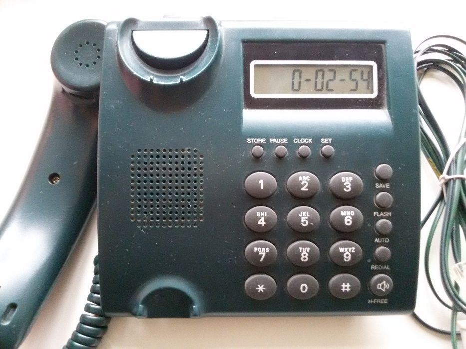 Телефон стационарный кнопочный с часами