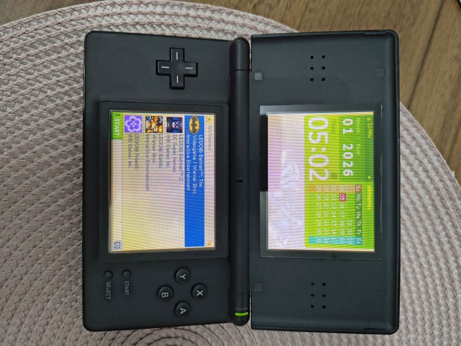 Nintendo DS Lite, cablu alimentare, modat card 64gb