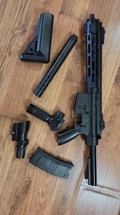 Super pusca HK 416d carabina de asalt 6mm,luneta,lumina led,demontabila,bile bonus !