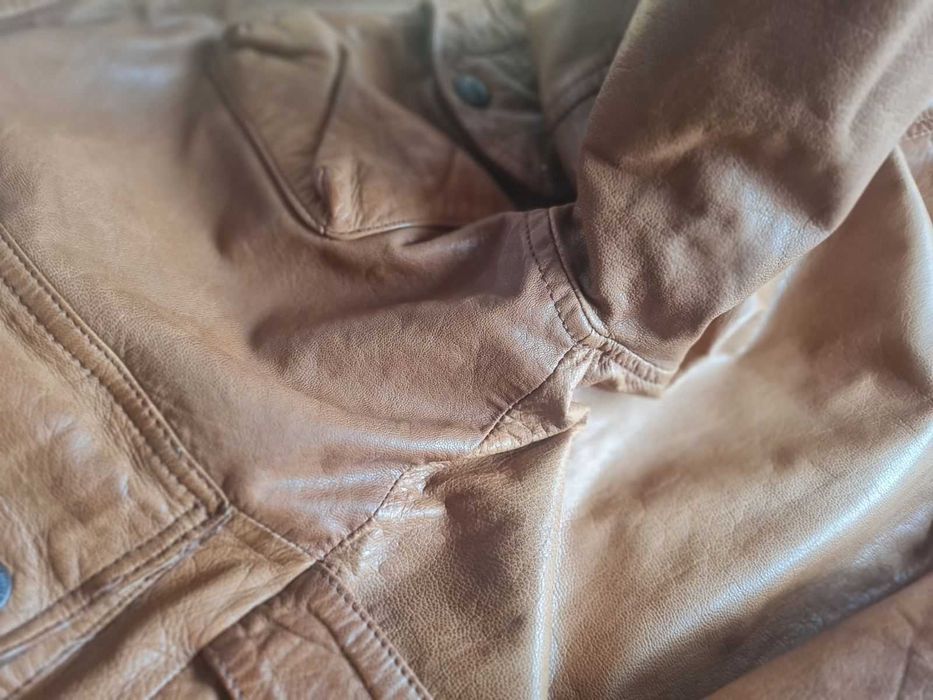 Яке от агнешка кожа , носено веднъж на бал.