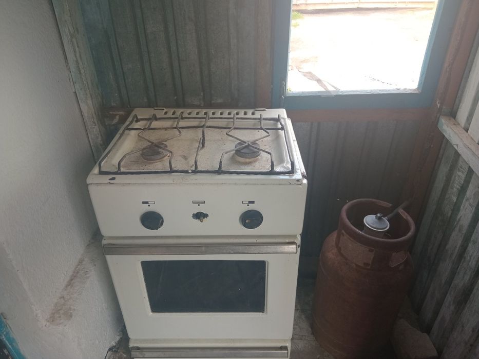 Продам газ плиту и балон с редактором