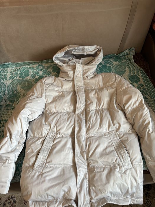 Продам пуховик в хорошем состянии 52 размера  мужской теплый