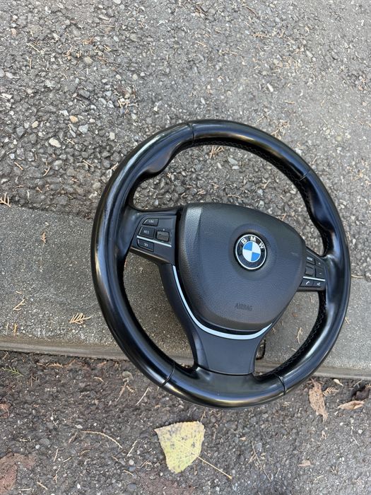Volan Bmw cu comenzi in stare f buna