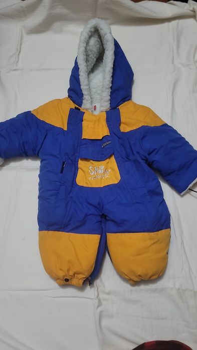 Продам детские комбинезончики б/у