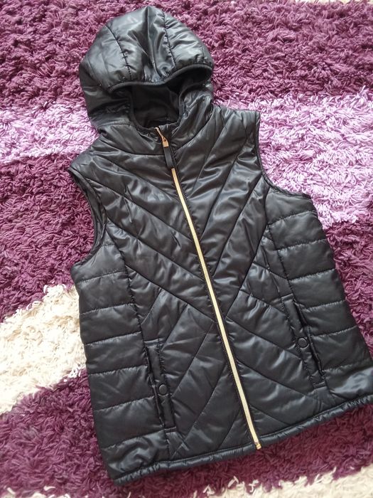 Vestă damă ca nouă.