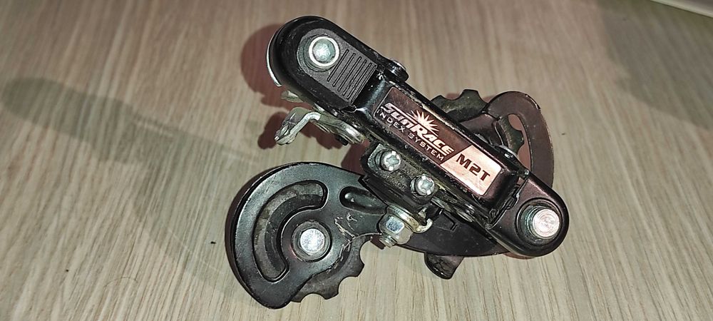 schimbator pt. pinioane bicicleta SUNRACE M2T pt. 6-7 pinioane patina mica pret 40 ron ( lipsa un surub pt. reglaj ( unde intra