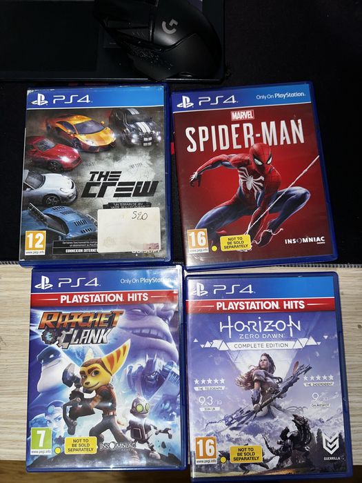 PlayStation 4 Slim + 4 jocuri