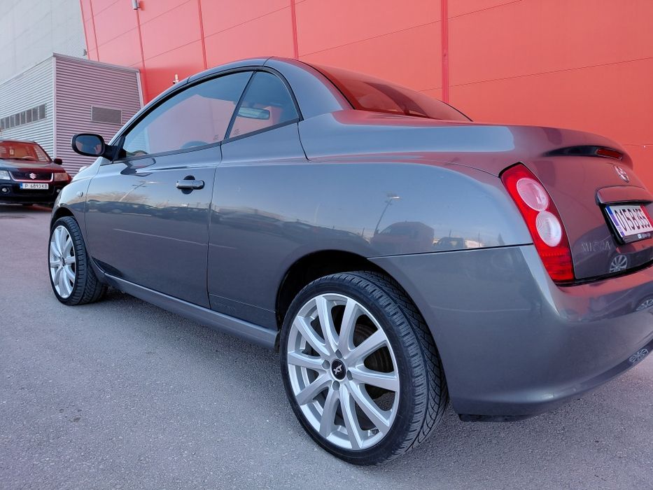 Нисан 1.4Бензин Кабриолет