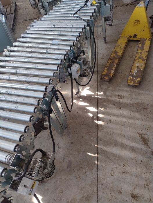 Banda cu role acționat electric