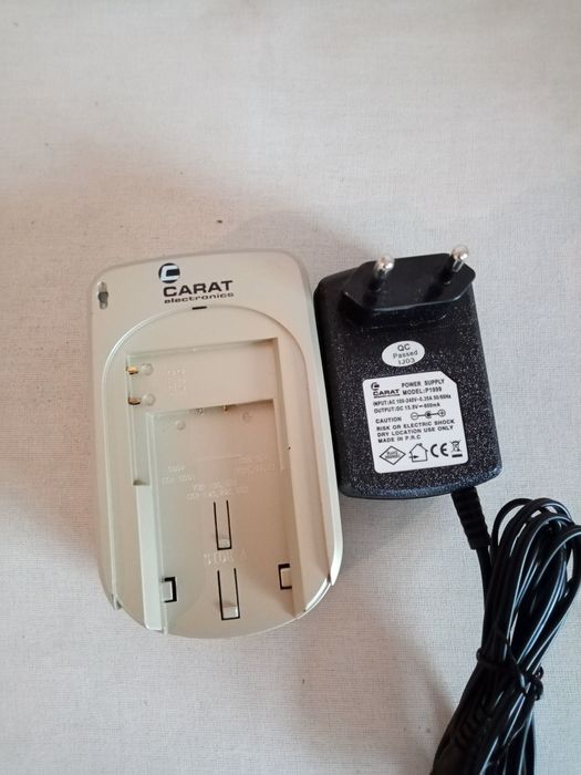 Зарядно за фотоапарати Панасоник.