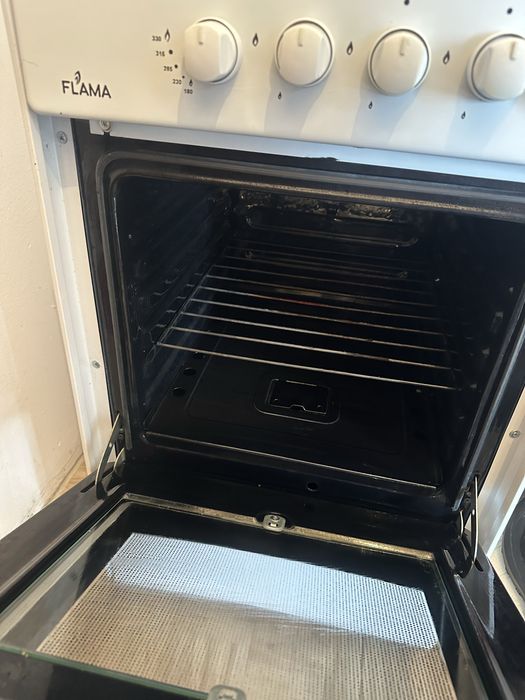 Газ плита FLAMA .