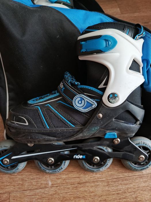 Роликовые коньки