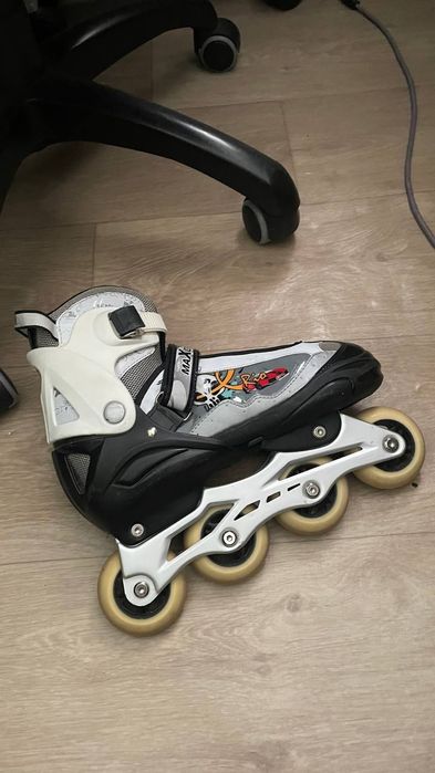 Роликовые коньки