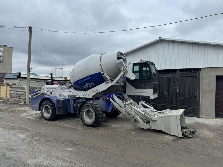 Автобетоносмеситель с самозагрузкой кармикс
