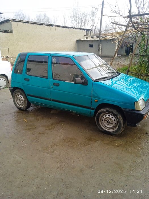 Tiko. Yili 99. Propangazda. Ruxsati yoʻq benzin yozilgan. Lekin benzin