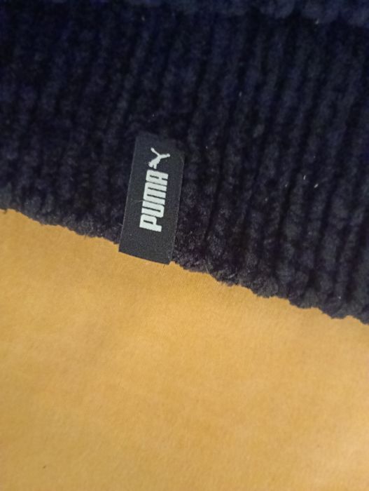 Căciulă originală Puma in stare foarte  bună.
