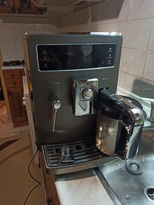 Кафе автомат Саеко Хелсис перфектен декалциран сменени клапани и уплат