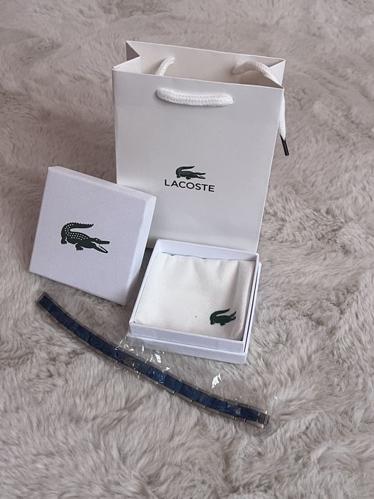 гривна Lacoste