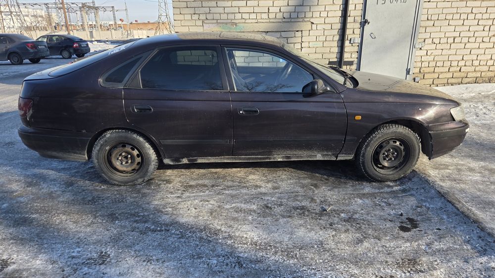 Продам тойоту карина е