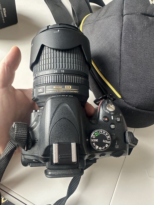Vand Nikon D5100 cu obiectiv Nikon Dx VR 18-105mm