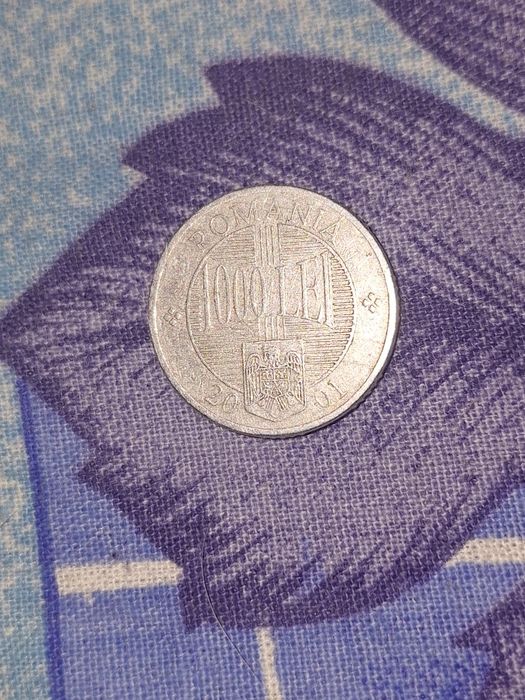 Vind moneda de 1000 lei (pret 400  lei)
