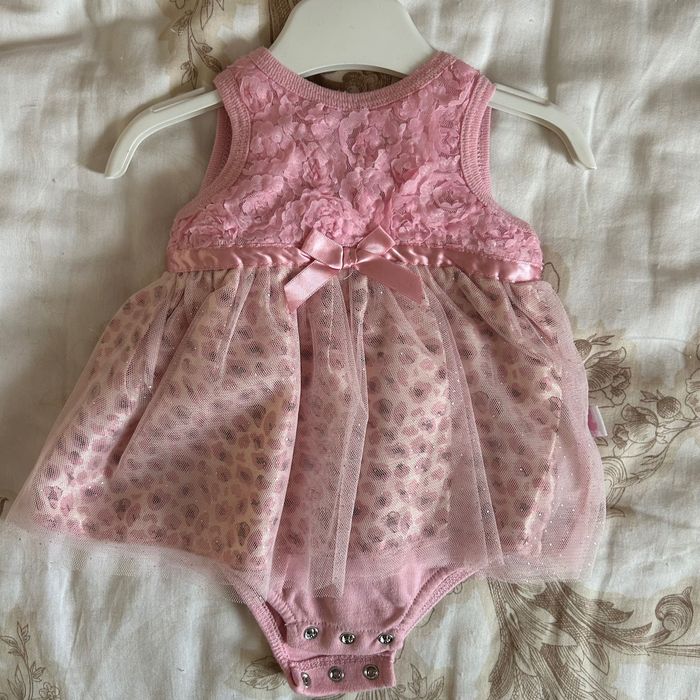 Дрехи за новородено