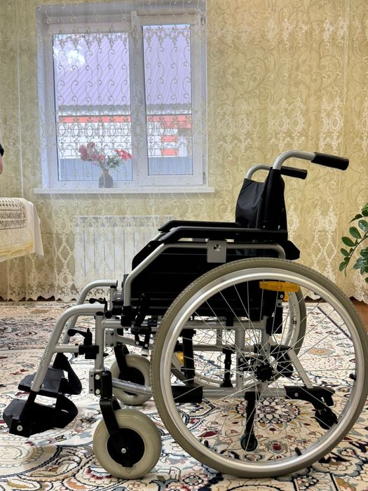 Инвалидная коляска
