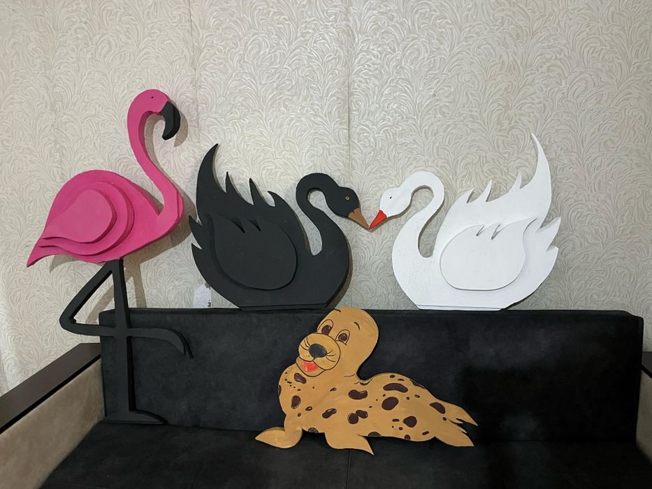 Фламинго лебедь тюлень