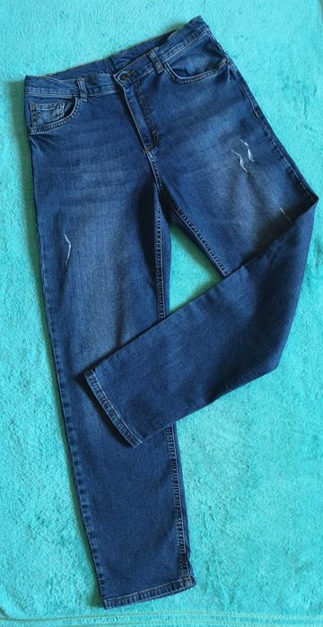 Фирменные джинсы на 13-14лет.