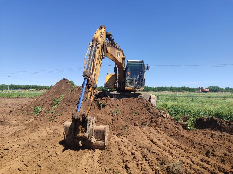 Продам колёсный экскаватор Caterpillar M318D