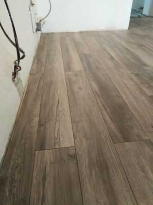 Установка плинтусов настил паркета ламината деревянных полов шлифовка