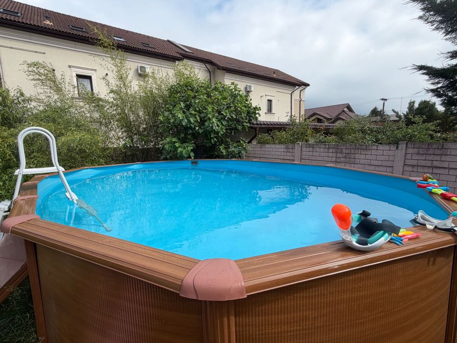 Piscina supraterana Gre Pacific ovala cu pereti metalici imitatie de lemn 730 x 375 h 120cm