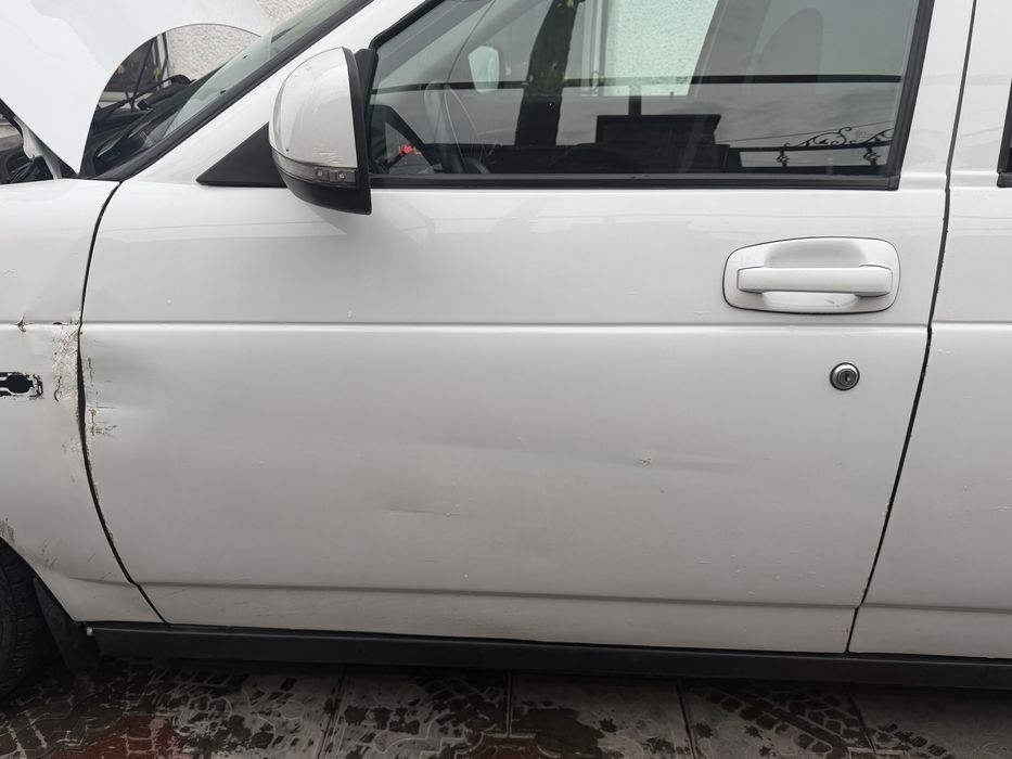 Продам крыло и дверы голы