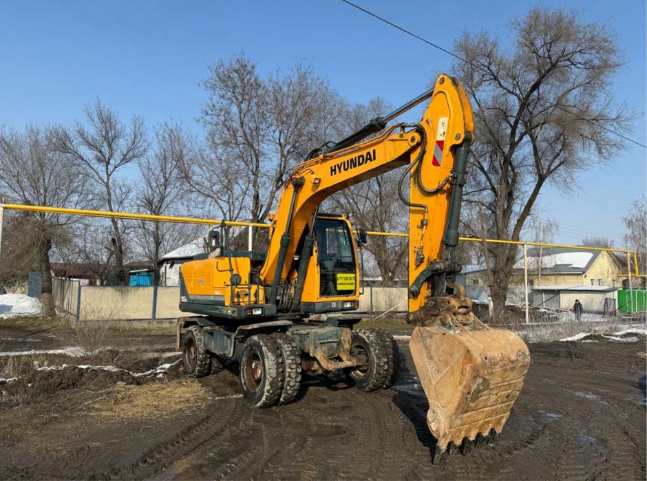 Колесный Экскаватор с Гидромолотом