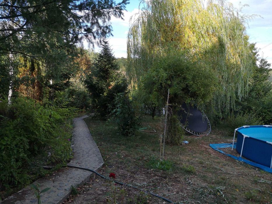 Casa + anexa locuibila + curte, gradina, padure peste 5000 mp