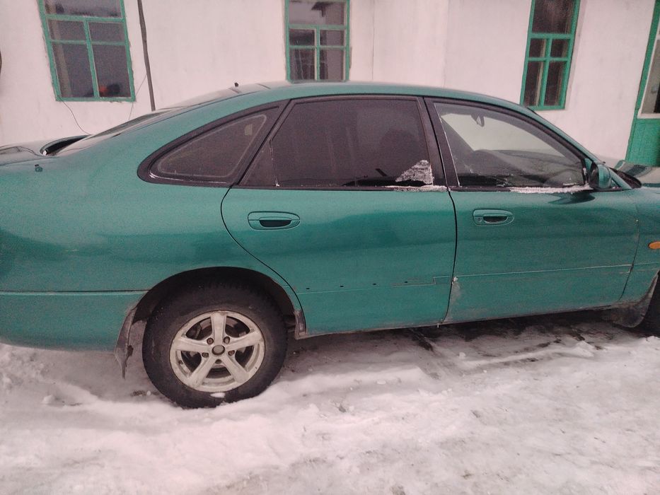 Продам мазда кронос