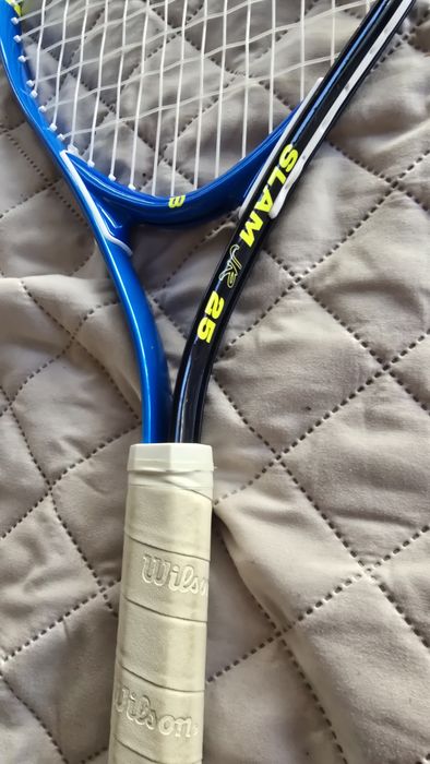 Rachetă tenis copii Wilson Slam Jr 25 (8-10 ani)Rachetă tenis copii Wilson Slam Jr 25 (8-10 ani)