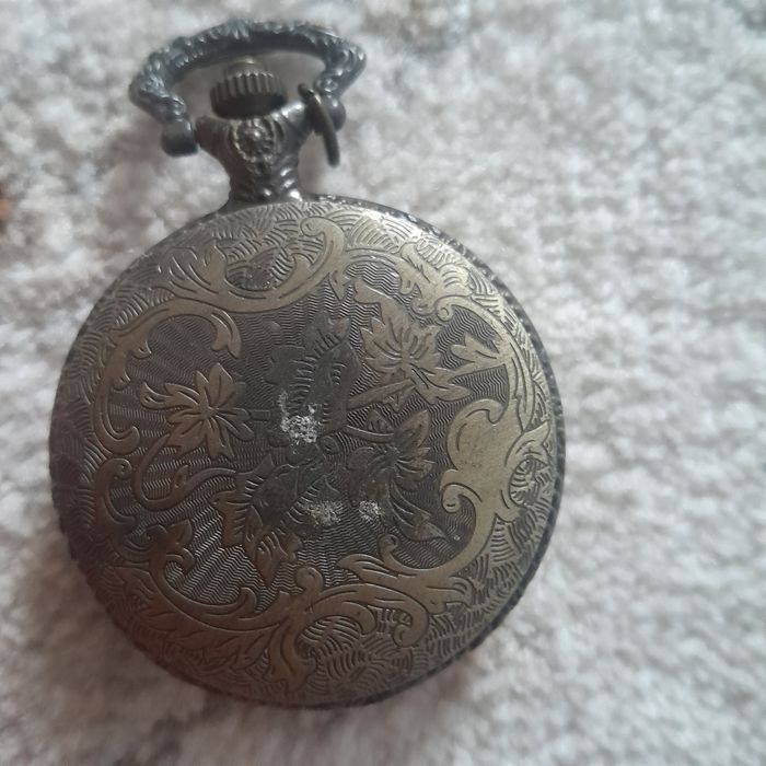 Карманные часы с символом S