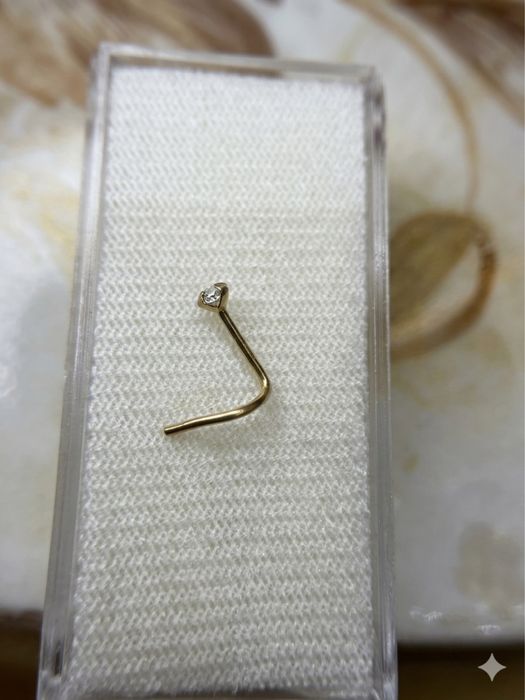 Золотая серьга в нос