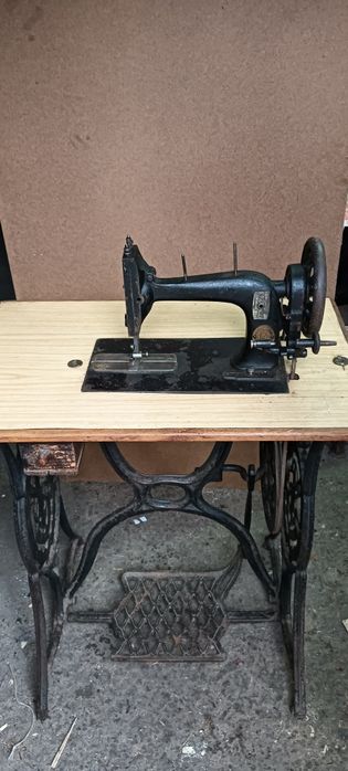 Mașina de cusut Singer