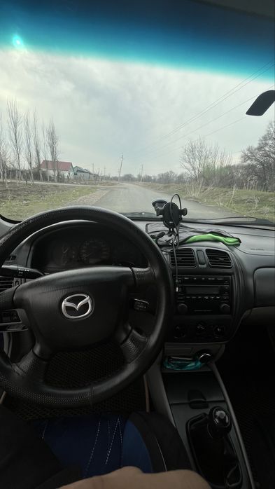 Мазда 323 хетчбек