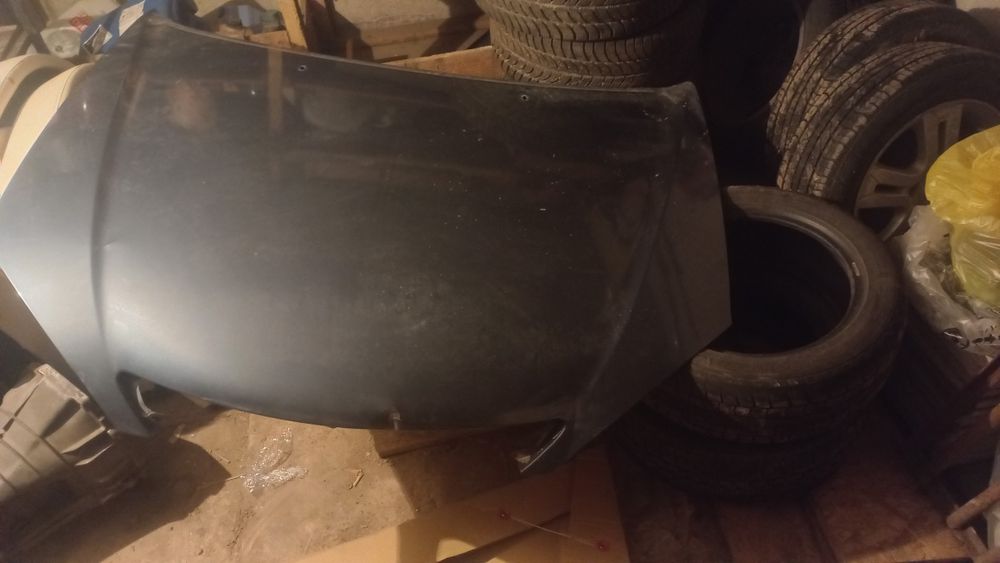 Продою капот от камри30 араб есть не больщой  в мятина двух местах