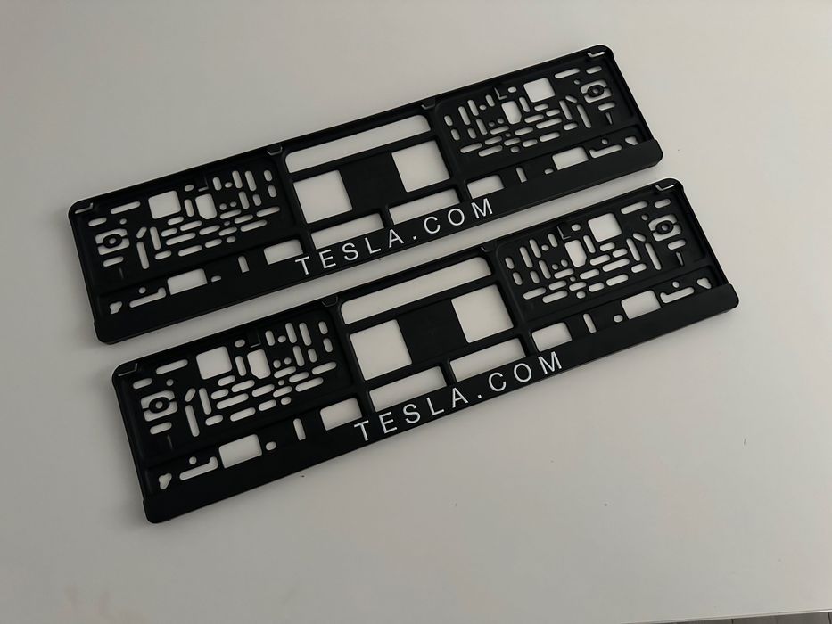 set suport suporti numar auto universal Tesla 2 bucati, sunt noi