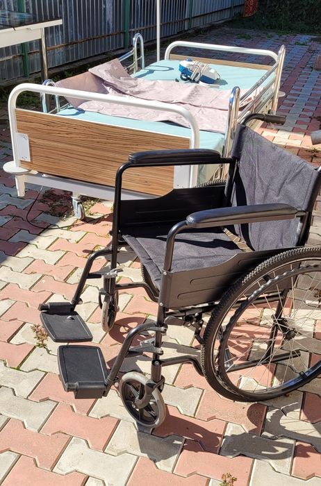 Pat electric cu telecomanda pentru persoane cu dizabilități .